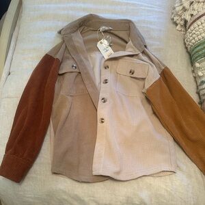 Never worn corduroy color block jacket size small new with tags!
